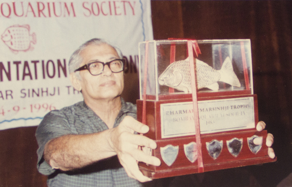 Dr. Chhapagar receiving Dharmakumarsinhji Trophy for ornamental fish keeping.